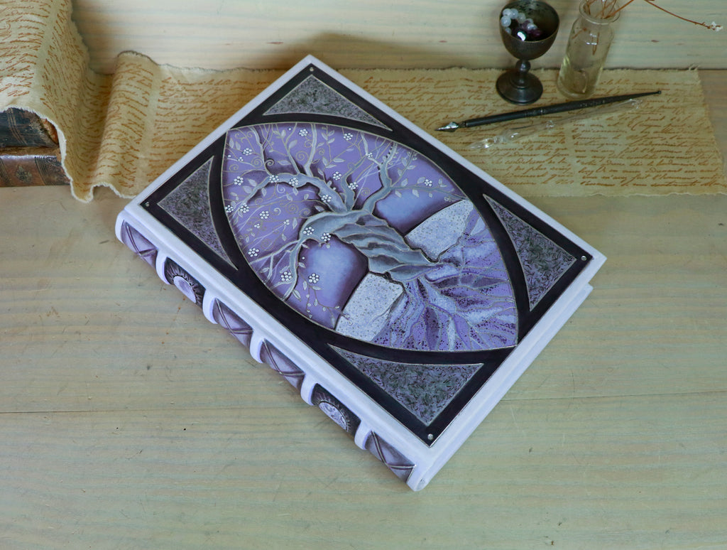 "Tree of Life and Tree of Knowledge" leather journal, light purple leather with silver tooled and white decoration