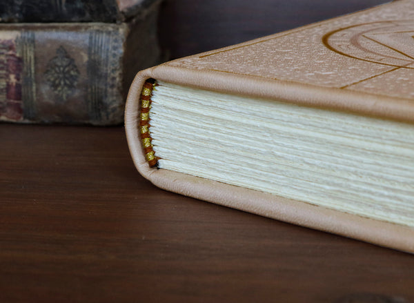 Natural leather journal with blind tooled decoration -  The Eye of the Universe