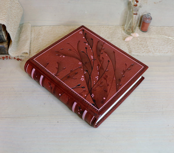 Red Leather Journal with floral decoration. Garden of Life