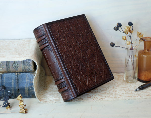 Brown leather journal with blind tooled decoration, Tea stained pages. Dark Chocolate