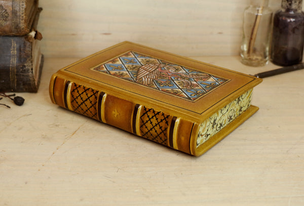 Leather journal with hand painted illuminated miniature on vellum and gold tooled decoration - Pelican Feeding Her Young