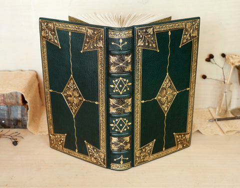 Dark Green Leather Journal with gold floral decoration. Romantic Journey