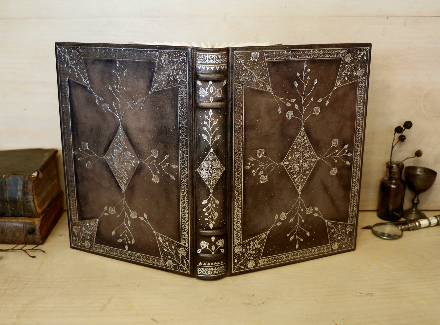 Grey Leather Journal with Silver tooled floral decoration. Moonlight Song