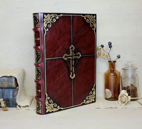 Antiqued red leather journal with cross decoration. One of a Kind - Faith
