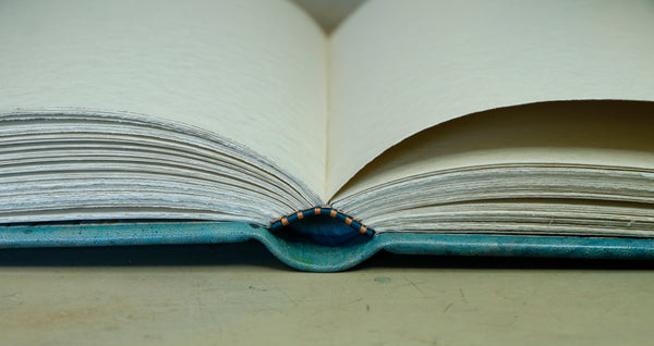 Light blue leather journal with tooled and painted decoration. One of a kind. Azure Mist