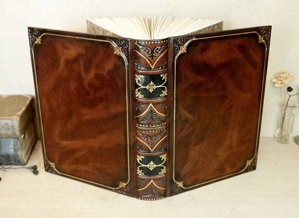Antiqued leather journal, brown red leather, Gold tooled decoration. Once Upon a Time