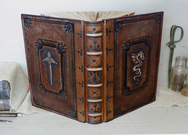 Large vintage leather journal, Tooled decoration with Dragon and Sword. Tea stained pages. "The Force within You"