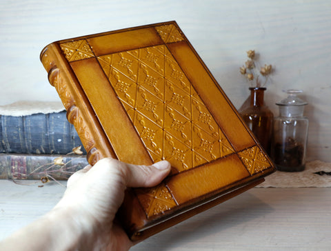 Antiqued yellow leather journal with tooled decoration. Romantic Sunset
