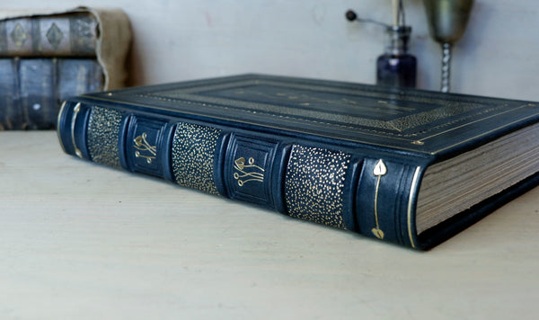 Dark Blue Leather Journal with gold floral decoration. The Midnight Garden
