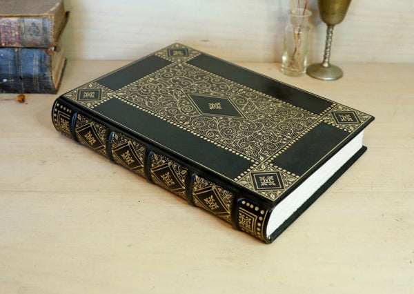 Black Leather Journal with gold floral decoration. Chronicles of the Soul