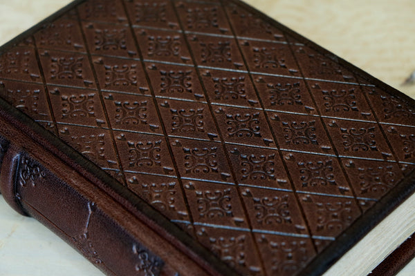 Brown leather journal with blind tooled decoration, Tea stained pages. Dark Chocolate