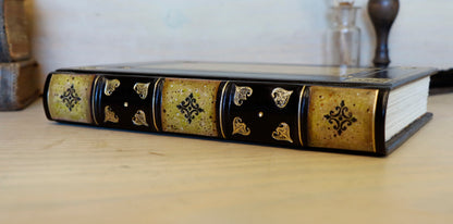 Black leather journal with tooled and hand painted decoration. Artist paper. Verdigris Dreams