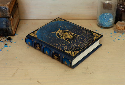 Blue leather journal with gold tooled decoration. Scarab of the Night