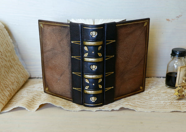 Vintage leather journal with tooled decoration - A Small Treasure