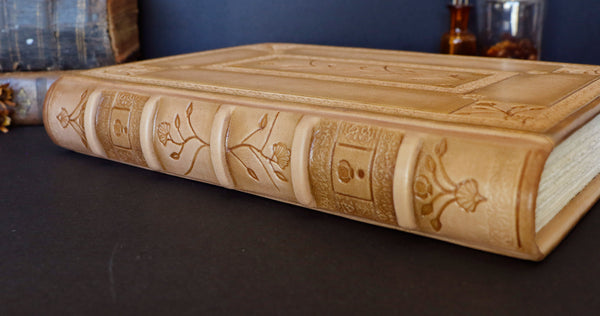 Beige leather journal with tooled floral decoration. Romantic Journey. One of a Kind.