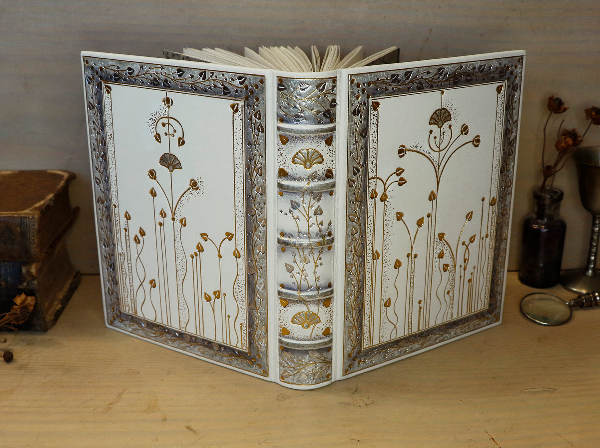 Ivory Dreams. White leather journal with gold and silver tooled decoration. One of a kind.