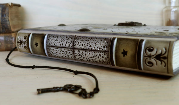 Metallic grey leather journal with tooled decoration, Lockable. The Circle of Time