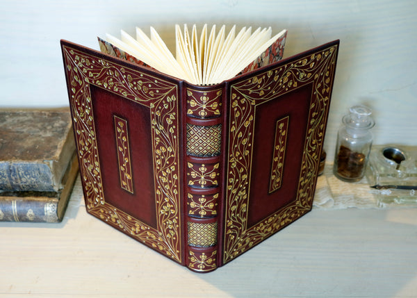 Burgundy leather journal with hand tooled gold decoration, Precious Moments