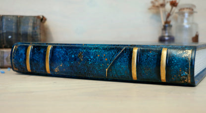 Polaris. Blue leather journal with hand marbled decoration. One of a Kind