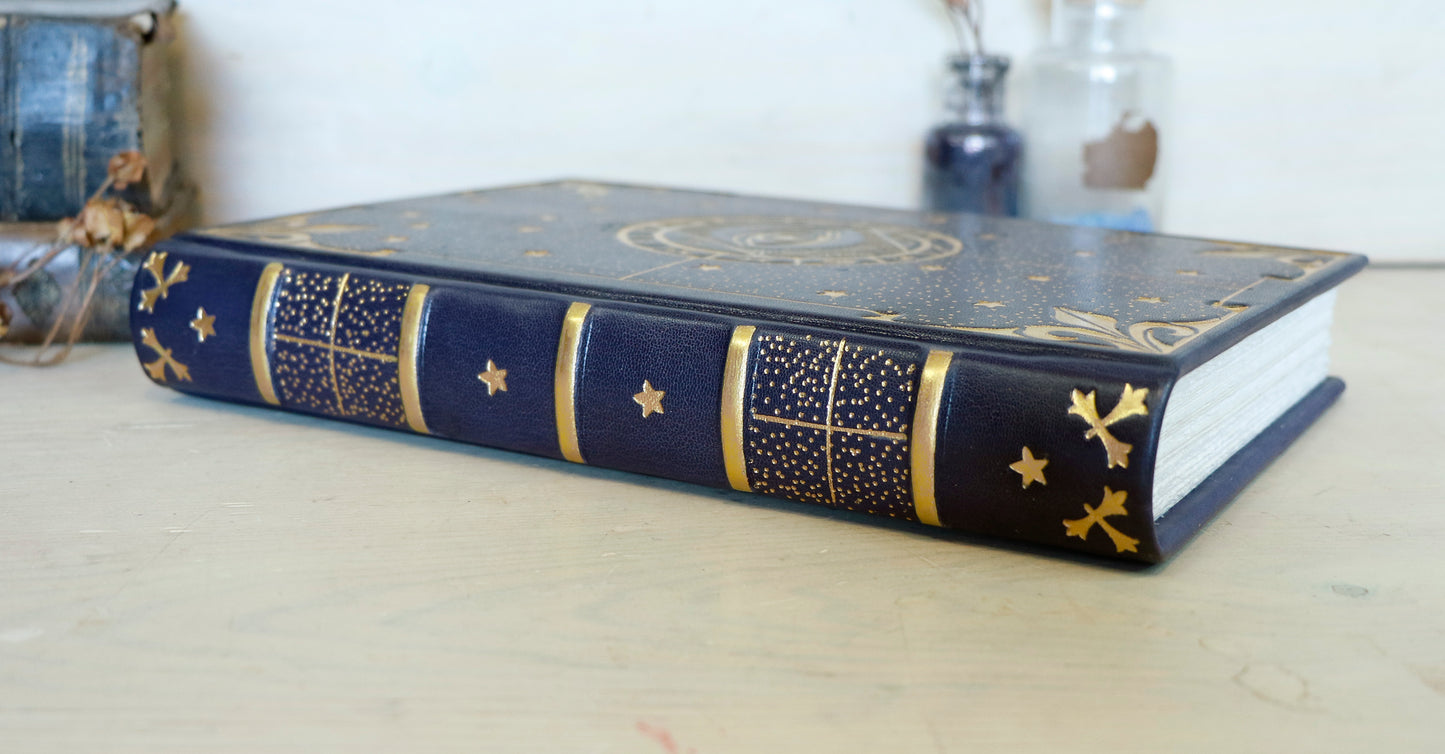 Dark blue leather journal with gold tooled decoration, The Circle of Time