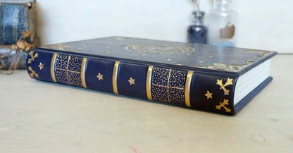 Dark blue leather journal with gold tooled decoration, The Circle of Time