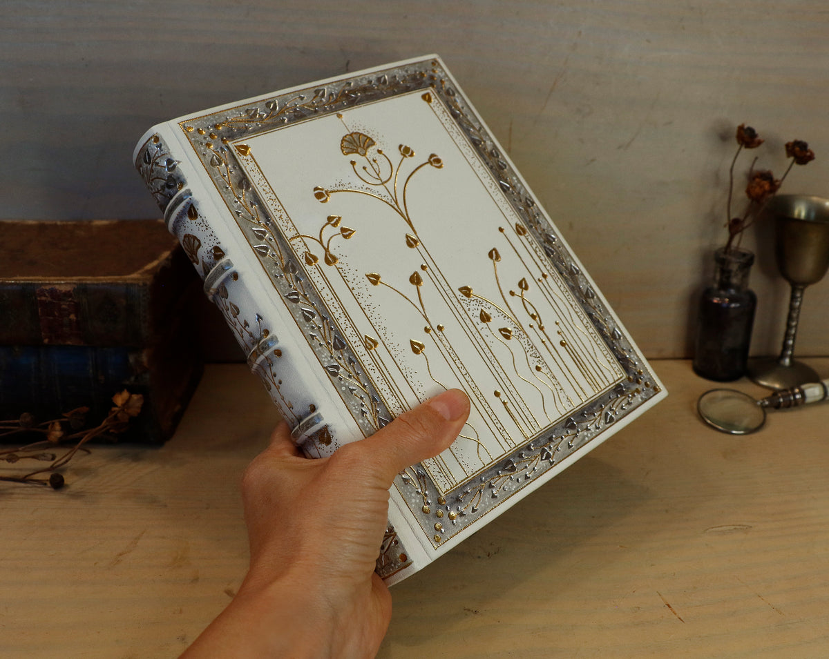 Ivory Dreams. White leather journal with gold and silver tooled decoration. One of a kind.