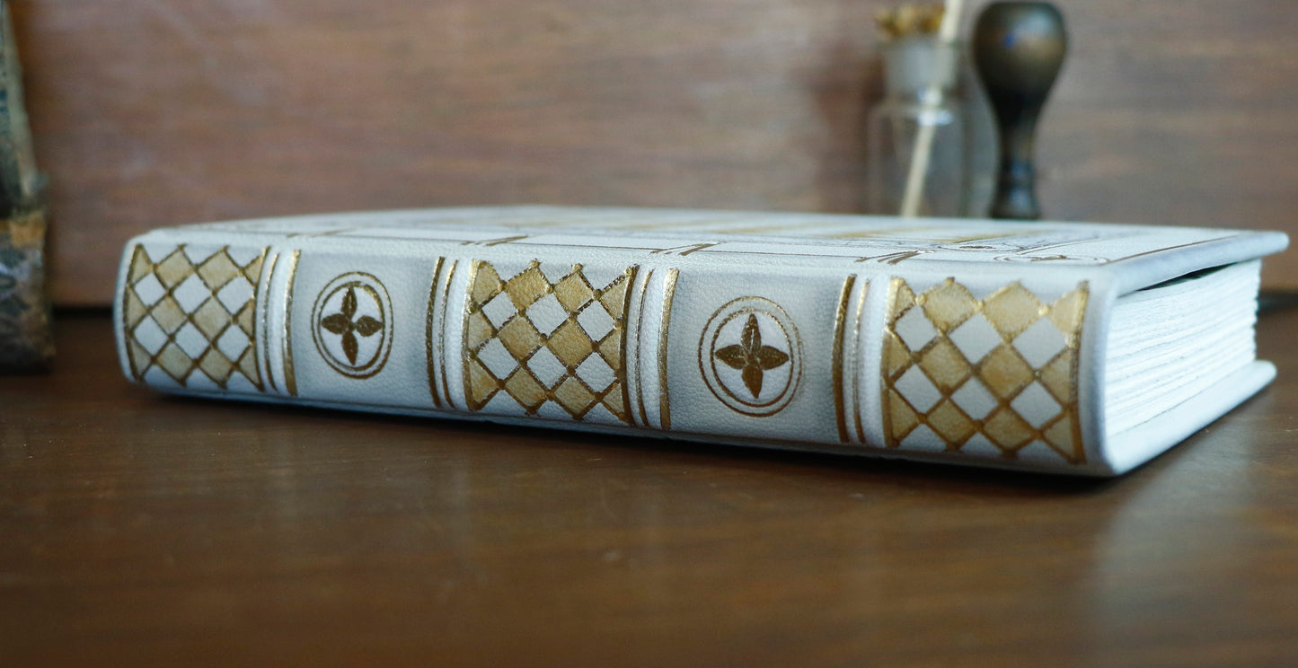 Ivory Dreams. White leather journal with gold tooled and painted decoration. One of a kind.