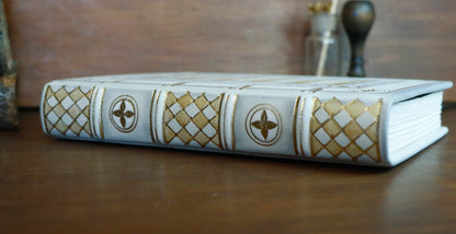 Ivory Dreams. White leather journal with gold tooled and painted decoration. One of a kind.