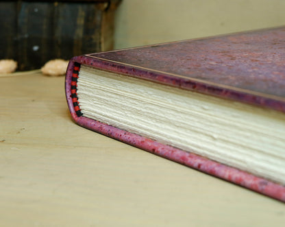 Antique pink leather journal with hand marbled decoration - An Old Romance