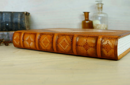 Antiqued orange leather journal with tooled decoration. Romantic Sunset II