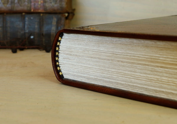 Antiqued leather journal, brown red leather, Gold tooled decoration. Once Upon a Time