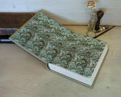 Beige leather journal with tooled floral decoration. Echoes of Earth. One of a kind.