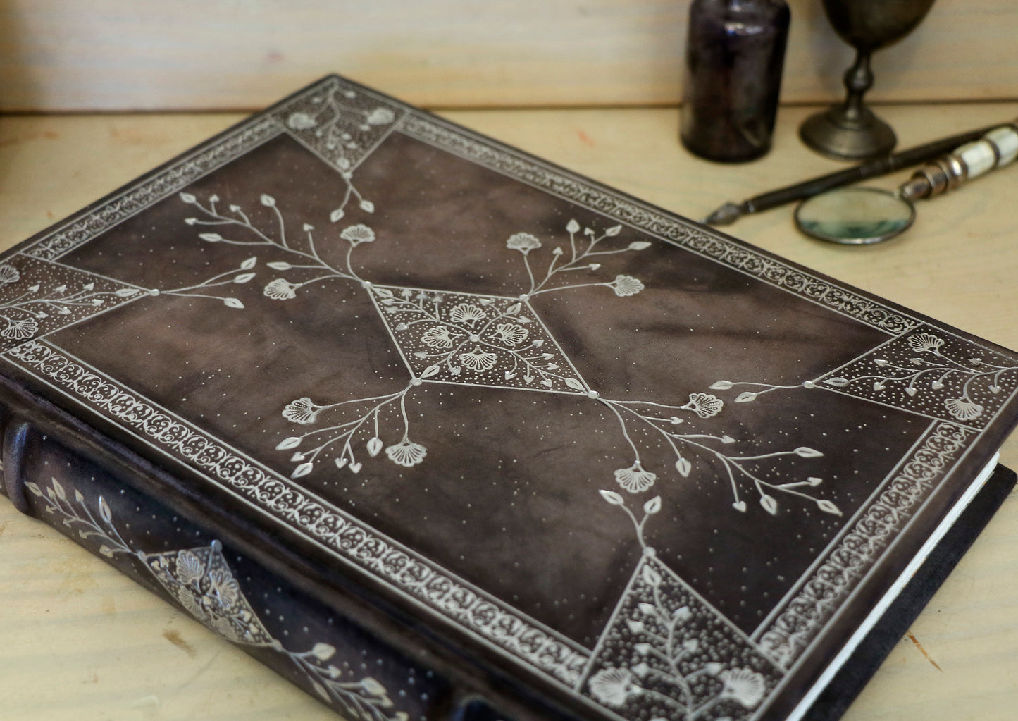 Grey Leather Journal with Silver tooled floral decoration. Moonlight Song