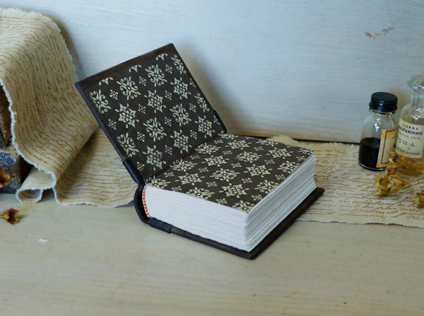 Vintage leather journal with tooled decoration - A Small Treasure