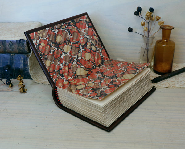 Brown leather journal with blind tooled decoration, Tea stained pages. Dark Chocolate