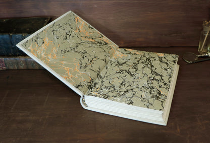 Ivory Dreams. White leather journal with gold tooled and painted decoration. One of a kind.