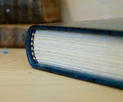 Polaris. Blue leather journal with hand marbled decoration. One of a Kind