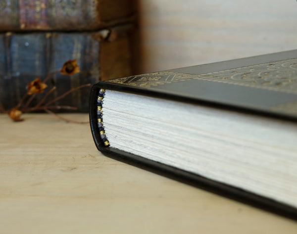 Black Leather Journal with gold floral decoration. Chronicles of the Soul