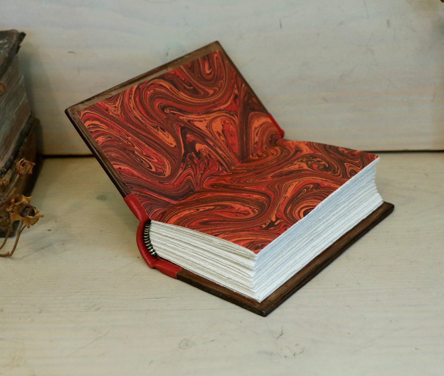 Small Vintage Journals, Brown worn leather with red spine, tooled decoration. The Vow