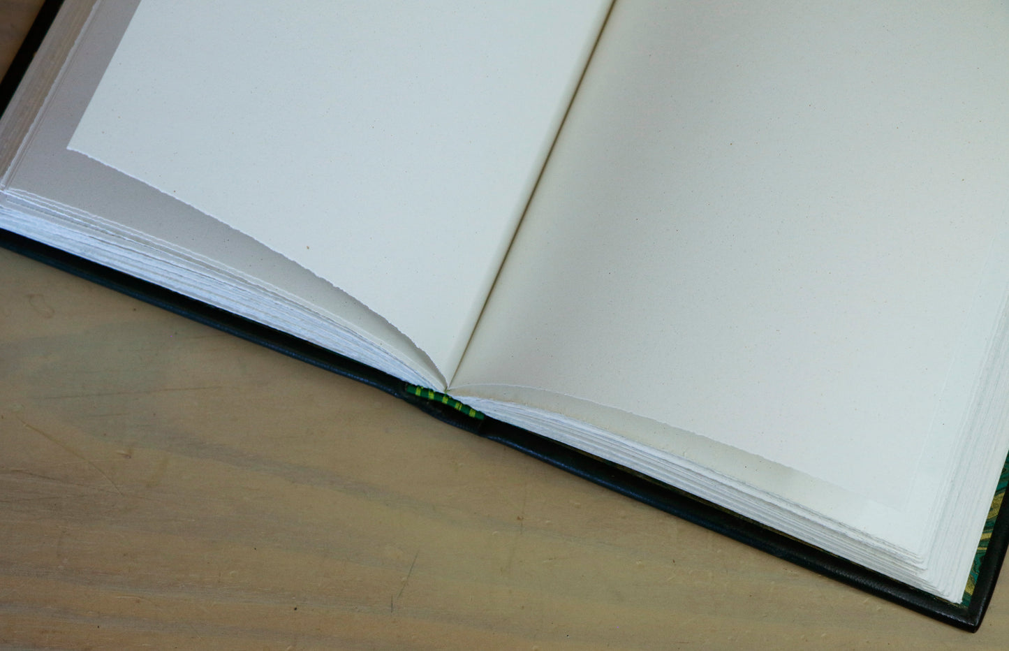 Dark Green Leather Journal with gold and green tooled decoration. Emerald Garden