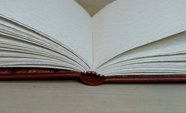 Red Leather Journal with floral decoration. Garden of Life