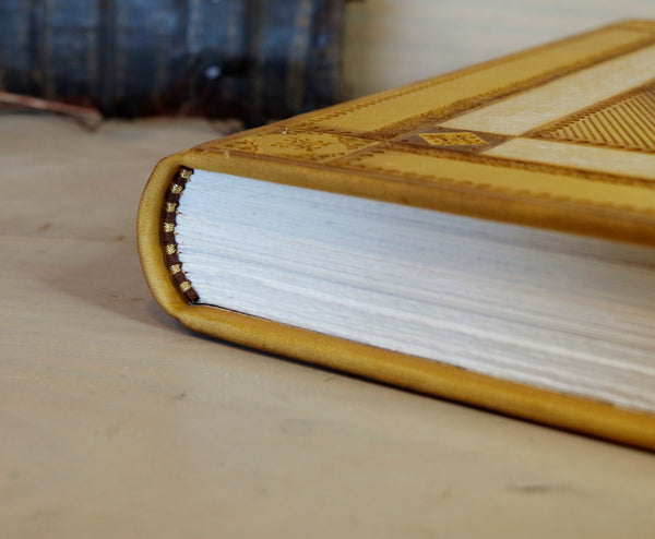 Antiqued yellow leather journal with tooled decoration. Romantic Sunset II