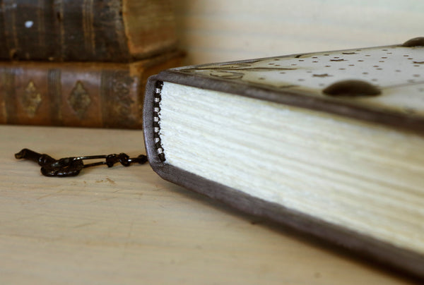 Metallic grey leather journal with tooled decoration, Lockable. The Circle of Time
