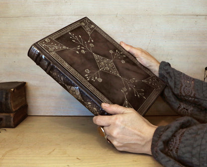 Grey Leather Journal with Silver tooled floral decoration. Moonlight Song
