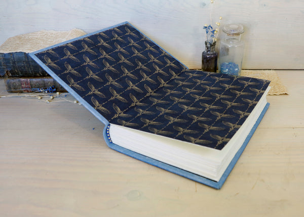 Light blue leather journal with gold tooled decoration, The Circle of Time