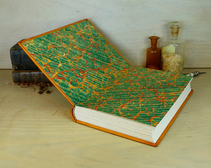 Antiqued orange leather journal with tooled decoration. Romantic Sunset II