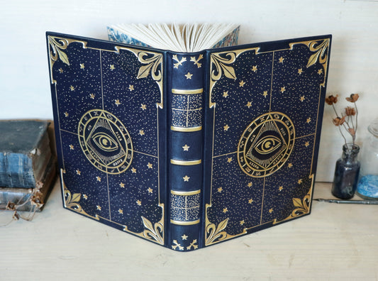 Dark blue leather journal with gold tooled decoration, The Circle of Time