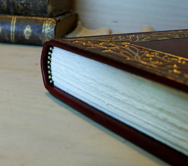 Burgundy leather journal with hand tooled gold decoration, Precious Moments