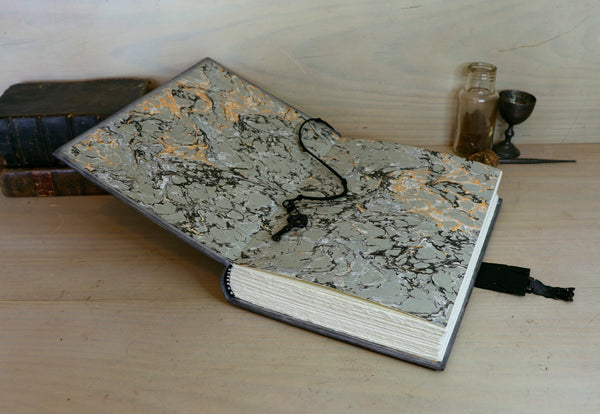Metallic grey leather journal with tooled decoration, Lockable. The Circle of Time