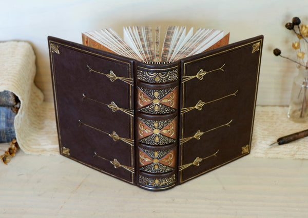 Leather journal with painted edges. Gold tooled and hand painted decoration. Secret Treasure